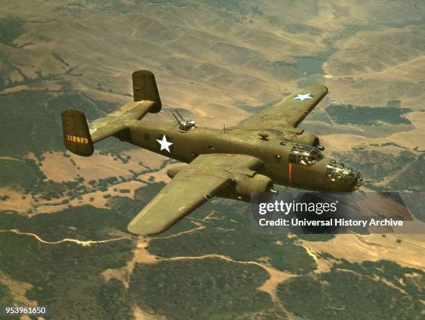 WW2-era photo postcard of US B-25 bomber on training flight WW2-era photo postcard of US B-25 bomber on training flight