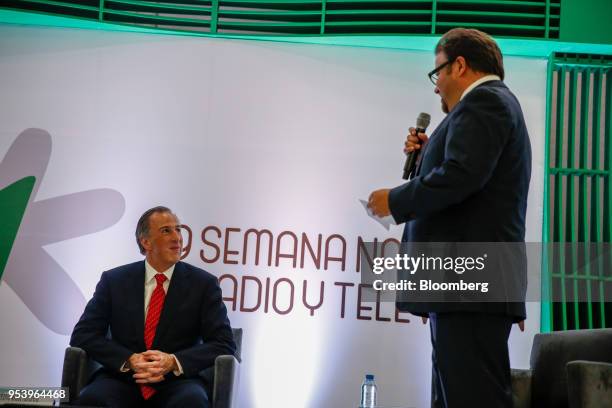 Jose Antonio Meade, presidential candidate of the Institutional Revolutionary Party , left, listens to Edgar Pereda, president of Camara Nacional de...