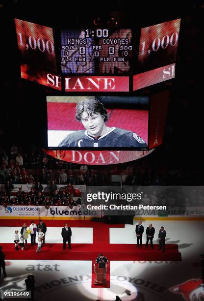 Shane Doan of the Phoenix Coyotes is honored before the game against the Los Angeles Kings for playing in 1,000 career NHL games at Jobing.com Arena...