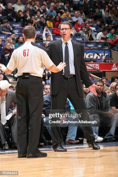 Head Coach Kiki Vandeweghe of the New Jersey Nets disputes with referee during game against the Houston Rockets during the game on December 26, 2009...