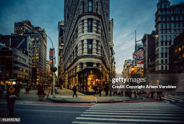the flatiron district in the evening - union square new york city stock pictures, royalty-free photos & images