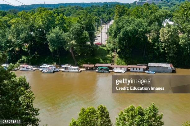 Moored house boats on the Kentucky River at Frankfort Kentucky USA.