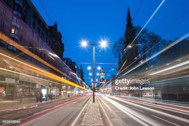 edinburgh twilight light trails - princes street stock pictures, royalty-free photos & images