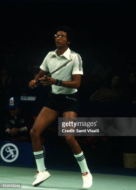 Arthur Ashe playing tennis on January 10, 1979 in New York, New York.