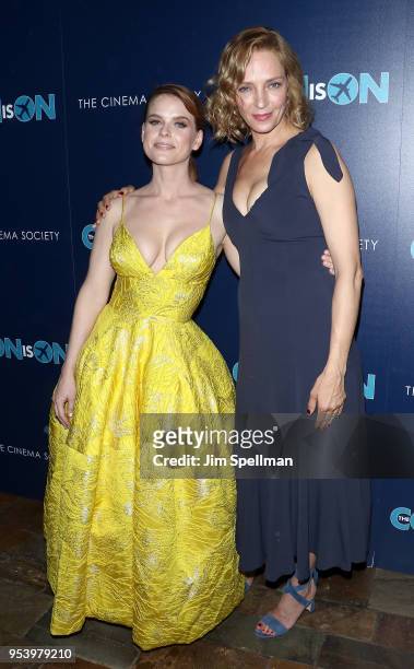 Actresses Alice Eve and Uma Thurman attend the screening of "The Con Is On" hosted by The Cinema Society at The Roxy Cinema on May 2, 2018 in New...