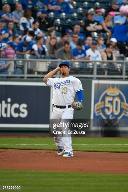 Cheslor Cuthbert of the Kansas City Royals throws to first for the out against the Chicago White Sox at Kauffman Stadium on April 27, 2018 in Kansas...