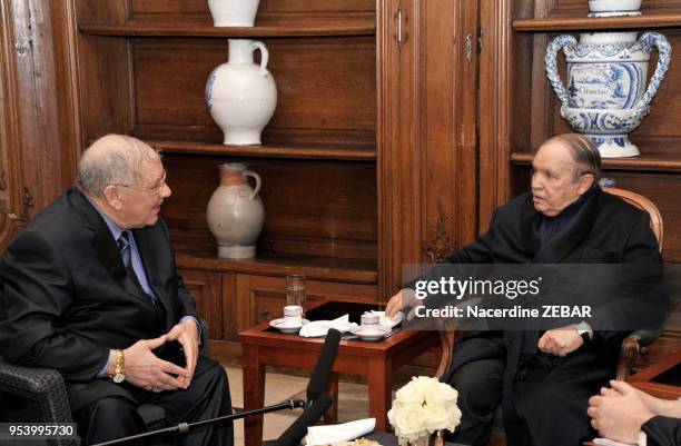 Handout photo shows Algeria's President Abdelaziz Bouteflika receiving Algerian Chief of Staff Ahmed Gaid Salah and Algeria's Prime Minister...