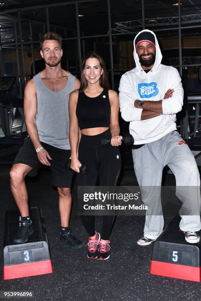 Sebastian Pannek with his girlfriend Clea-Lacy Juhn and Tamer Trasoglu during John's Bootcamp Opening on May 2, 2018 in Berlin, Germany.