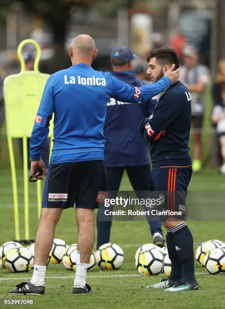 Victory coach Kevin Muscat speaks to Christian Theoharous of the Victory during a Melbourne Victory A-League training session at Gosch's Paddock on...