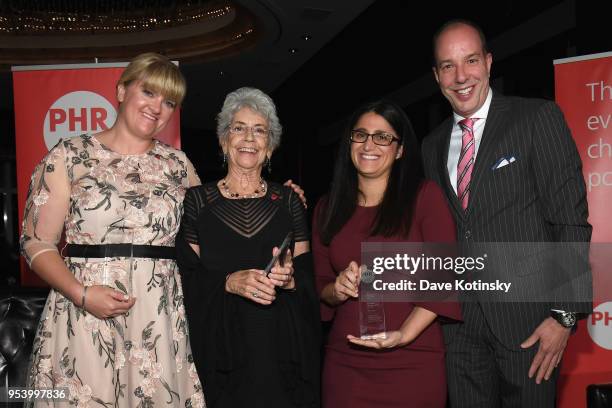 Honoree Alex Wubbels, RN, Dr. Norma Price, Dr. Mona Hanna-Attisha and American Civil Liberties Union Executive Director Anthony D. Romero pose...