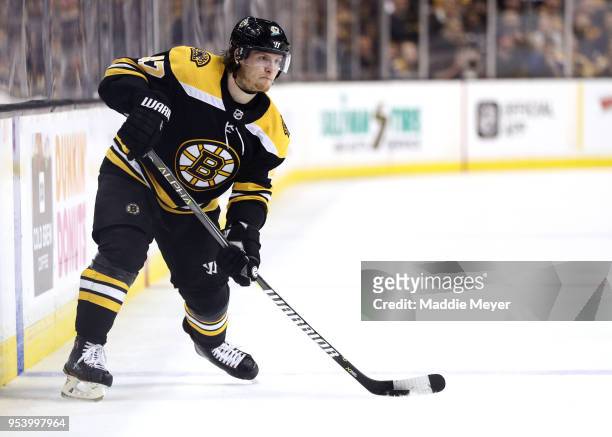 Torey Krug of the Boston Bruins skates against the Tampa Bay Lightning during the third period of Game Three of the Eastern Conference Second Round...