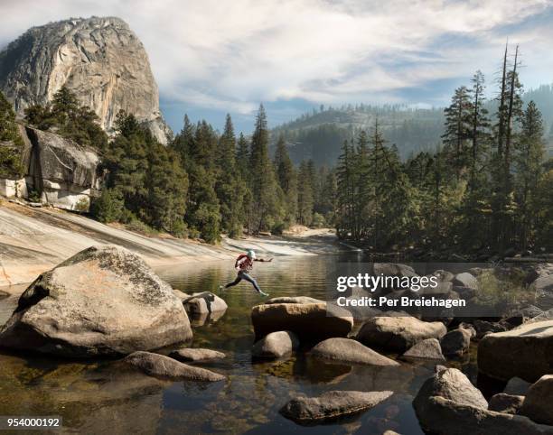 jumping from rock by emerald pool above vernal falls_yosemite - yosemite valley stock pictures, royalty-free photos & images