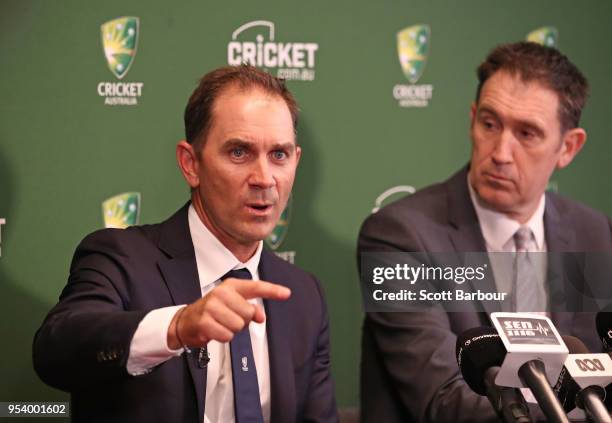 Justin Langer, coach of Australia speaks to the media as Cricket Australia CEO James Sutherland looks on during a press conference on May 3, 2018 in...