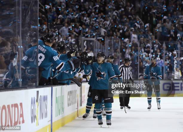 Marcus Sorensen of the San Jose Sharks is congratulated by teammates after he scored against the Vegas Golden Knights in the first period during Game...