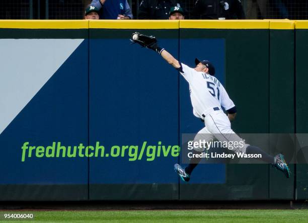 Ichiro Suzuki of the Seattle Mariners catches a line drive to left from Matt Chapman of the Oakland Athletics in the second inning at Safeco Field on...