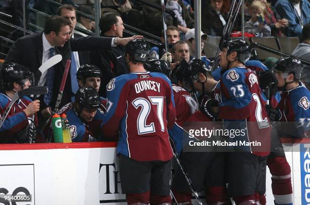 Coach Joe Sacco of the Colorado Avalanche talks to his players against the Dallas Stars at the Pepsi Center on December 26, 2009 in Denver, Colorado.