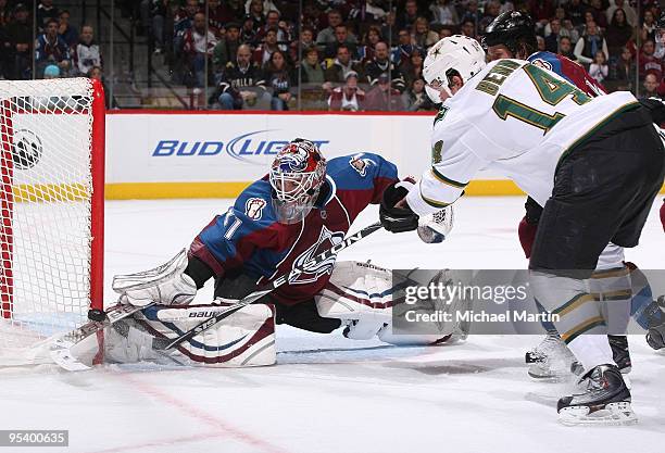 Goaltender Peter Budaj of the Colorado Avalanche makes a save against Jamie Benn of the Dallas Stars at the Pepsi Center on December 26, 2009 in...