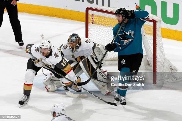 Jon Merrill and Marc-Andre Fleury of the Vegas Golden Knights defend the net against Melker Karlsson of the San Jose Sharks in Game Four of the...