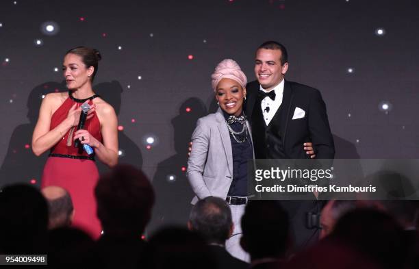 Founder Katharina Harf, Patient Marcus Cato greet donor Matene Cates on stage during The DKMS Love Gala 2018 at Cipriani Wall Street on May 2, 2018...