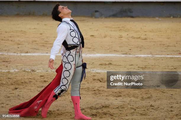 Bullfighter Gonzalo Caballero performs a pass on a bull during the bullfight festivity Goyesca 2 de Mayo at Las Ventas bullring in in Madrid, Spain...