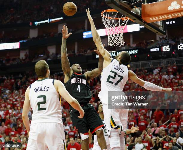 Tucker of the Houston Rockets takes a shot defended by Rudy Gobert of the Utah Jazz in the second half during Game Two of the Western Conference...