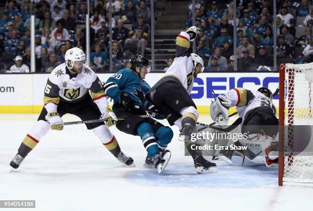 The Vegas Golden Knights stop Marcus Sorensen of the San Jose Sharks from scoring in the second period during Game Four of the Western Conference...