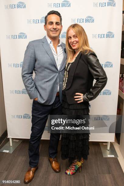 Angelo David Pisacreta and Robin Pack attend Angelo David Pisacreta & Jacob Guttman Celebrate Spring and Preview the Flex Brush on May 2, 2018 in New...