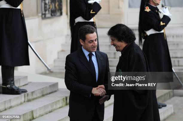 Le dirigeant libyen Mouammar Kadhafi a rencontré pour la seconde fois Nicolas Sarkozy à Paris le 12 mars 2012, France.
