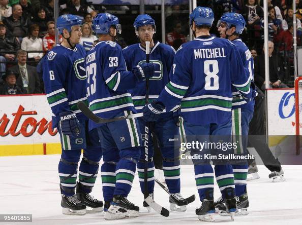 Sami Stylo Sami Salo, Henrik Sedin, Daniel Sedin, Willie Mitchell and Alexandre ...