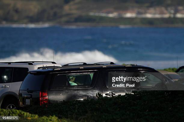 President Barack Obama leaves Pyramid Rock Beach at Marine Corps Base Hawaii on December 26, 2009 in Kailua, Hawaii. Obama and his family arrived in...