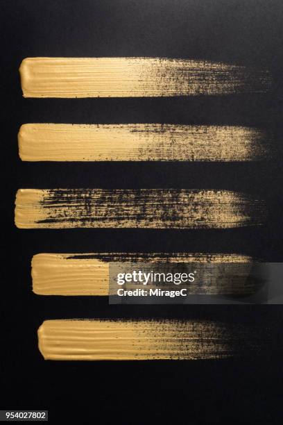 straight gold brush strokes - linear abstract painting stock pictures, royalty-free photos & images