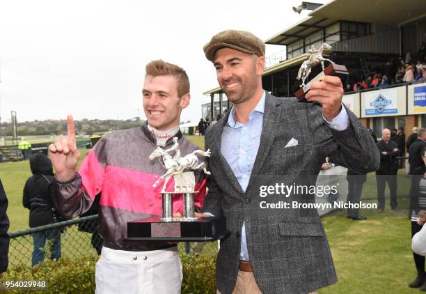 Clayton Douglas with Symon Wilde after winning the Waterfront by Lyndoch Living Grand Annual Steeplechase at Warrnambool Racecourse on May 03, 2018...