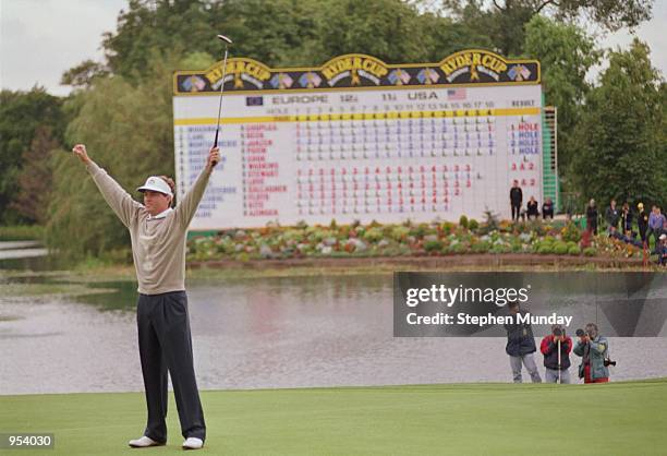 Davis Love III of the USA celebrates victory on the 18th green in his Final Day Singles match during the Ryder Cup at the Belfry in Sutton Coldfield,...