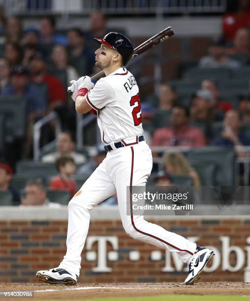 Third baseman Ryan Flaherty of the Atlanta Braves swings during the game against the Philadelphia Phillies at SunTrust Park on April 18, 2018 in...