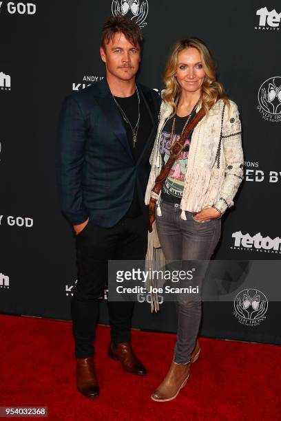 Luke Hemsworth and Samantha Hemsworth arrive at Teton Gravity Research's "Andy Iron's Kissed By God" World Premier at Regency Village Theatre on May...