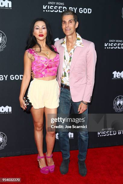 Etty Lau Farrell and Perry Farrell arrive at Teton Gravity Research's "Andy Iron's Kissed By God" World Premier at Regency Village Theatre on May 2,...