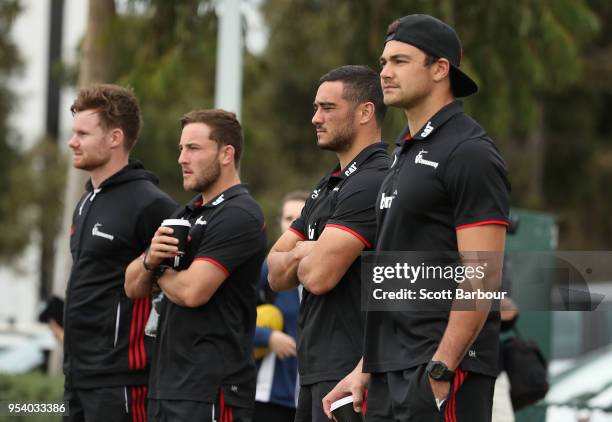 Members of the Crusaders Super Rugby team watch during a Melbourne Storm NRL training session at Gosch's Paddock on May 3, 2018 in Melbourne,...