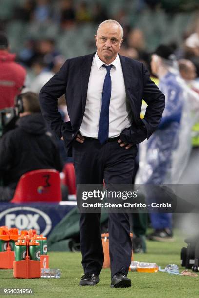 Graham Arnold of Sydney walks the coaches bench during the A-League Semi Final match between Sydney FC and Melbourne Victory at Allianz Stadium on...