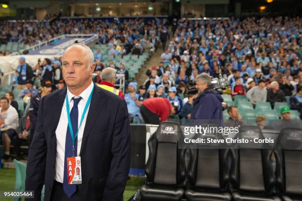 Graham Arnold of Sydney waits for the game to start during the A-League Semi Final match between Sydney FC and Melbourne Victory at Allianz Stadium...