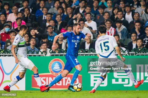 Fernando Recio Comi of Kitchee SC is tackled by Jeonbuk Hyundai Motors players during the AFC Champions League Group E match between Kitchee and...