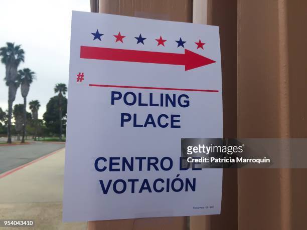 polling place sign - bilingual stock pictures, royalty-free photos & images