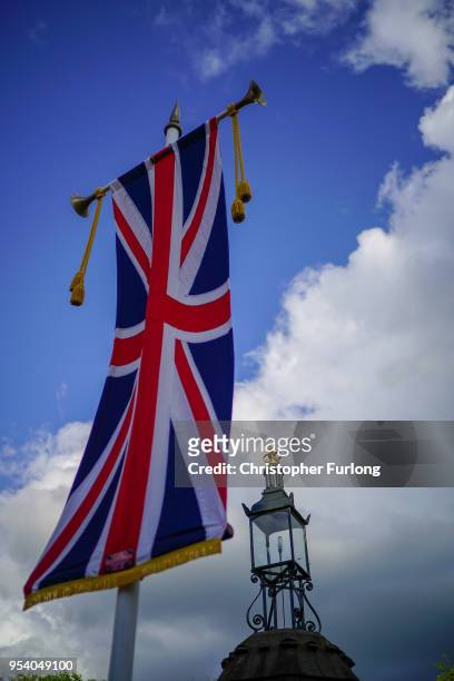 Union flags adorn the streets of Windsor as the town prepares for the wedding of Prince Harry and his fiance, US actress Meghan Markle, May 2, 2018...