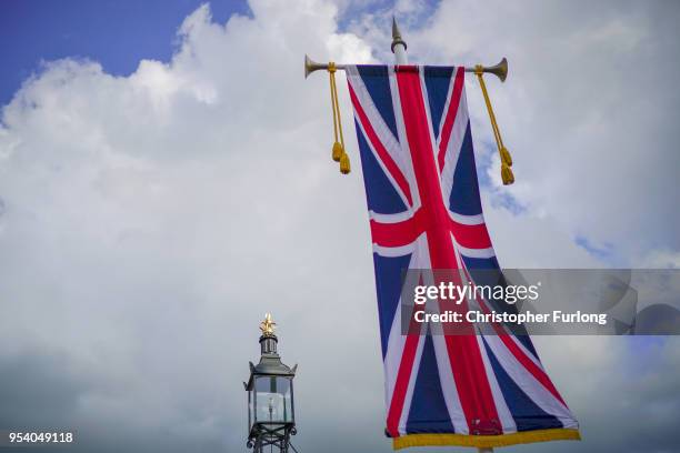 Union flags adorn the streets of Windsor as the town prepares for the wedding of Prince Harry and his fiance, US actress Meghan Markle, May 2, 2018...