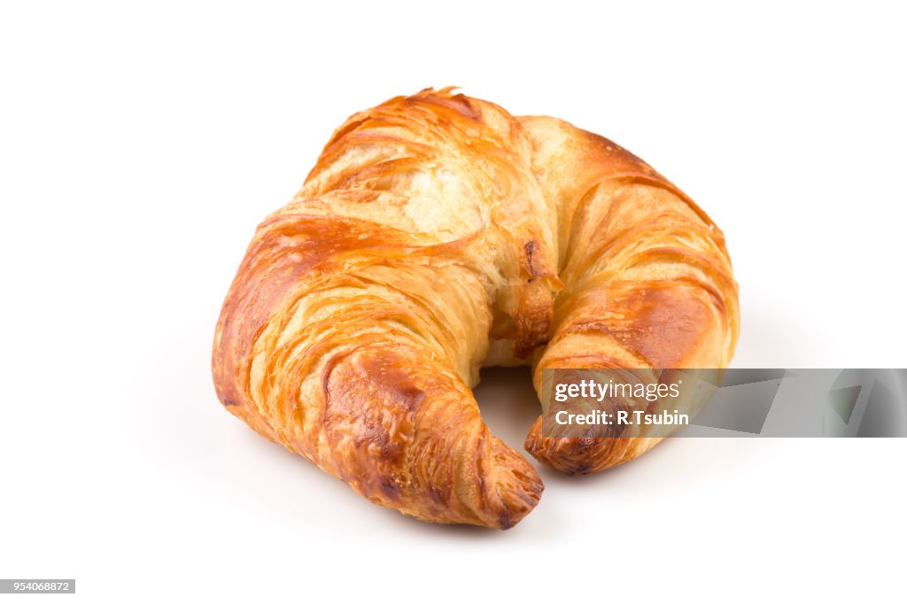 Fresh croissant isolated on the white background