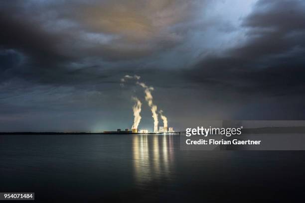 The lignite-fired power station of Boxberg is pictured at night on April 28, 2018 in Klitten, Germany.