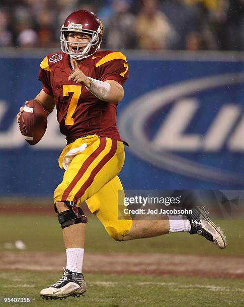 Matt Barkley of the USC Trojans passes against the Boston College Eagles during the 2009 Emerald Bowl at AT&T Park on December 26, 2009 in San...