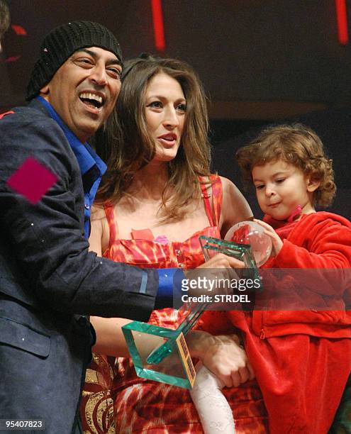 Indian winner of show Vindu Dara Singh poses with his wife and daughter at a ceremony to mark the end of the current season of the popular...