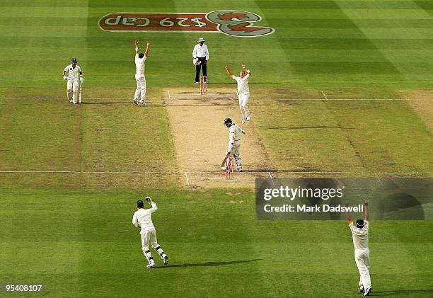 Peter Siddle of Australia appeals for a caught behind decision on Mohammad Yousuf of Pakistan during day two of the First Test match between...