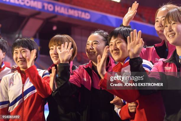 Teams of North Korea and South Korea pose together for a picture at the World Team Table Tennis Championships 2018 in Halmstad, Sweden May 3, 2018. -...