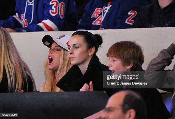 Lindsay Lohan, Ali Lohan and Dakota Lohan attend the New York Islanders vs New York Rangers game at Madison Square Garden on December 26, 2009 in New...